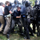 White supremacist demonstrators in Charlottesville push against riot police on August 12, 2017, with virtually no repercussions from police (Photo by Chip Somodevilla/Getty Images)